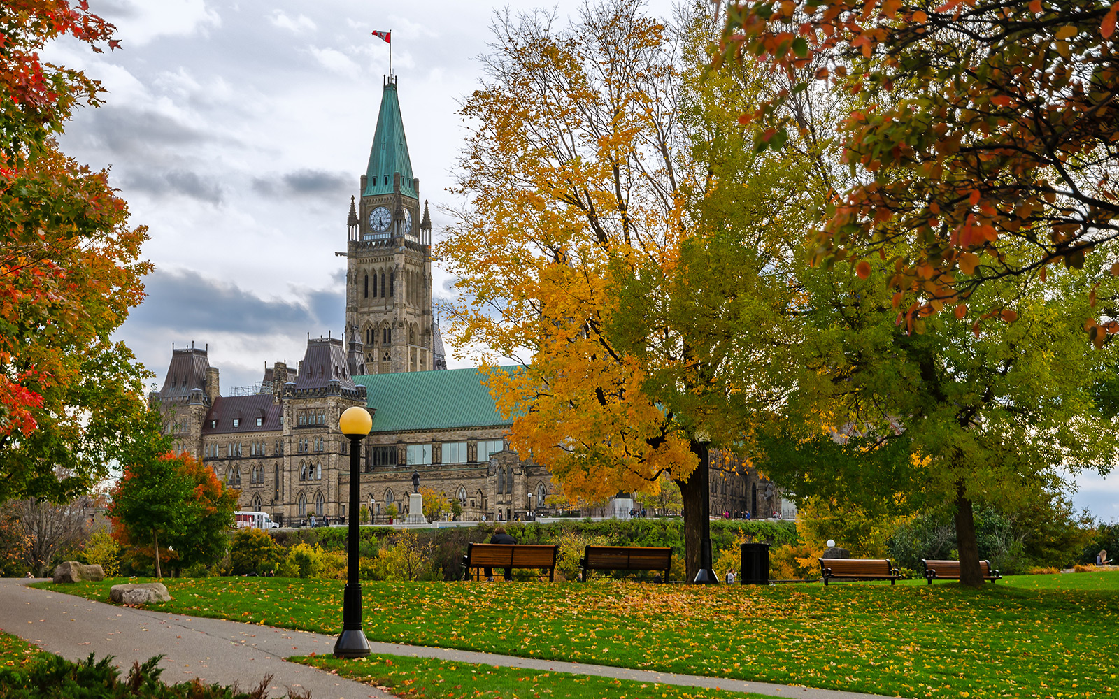 Canadian Parliament Buildings in autumn seen from Majors Hill Park in Ottawa Canada.