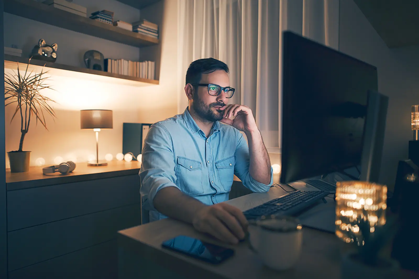 man working on his desktop 