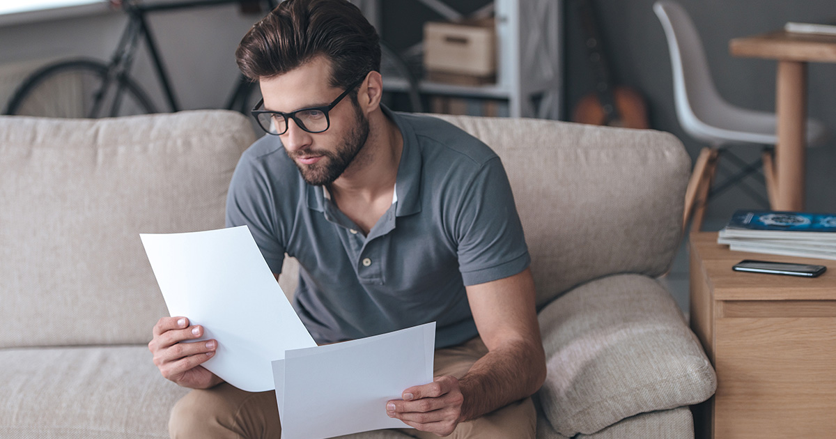 man assesses all aspects of his current financial situation