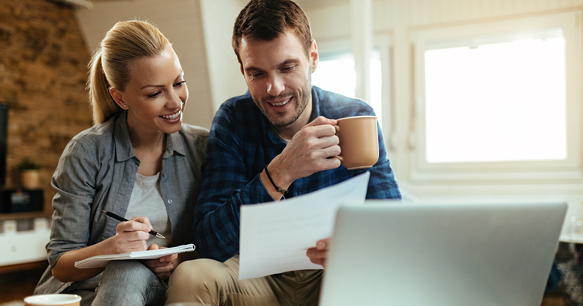 Man and woman discussing budgets