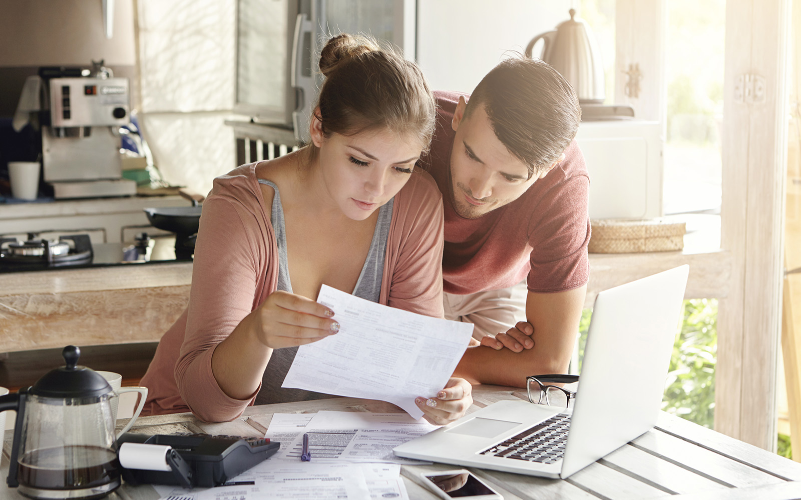 Couple looking at expenses