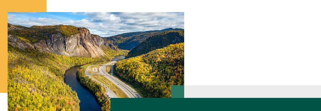 Scenic road in Canadian Mountain Landscape Valley with River Fall Season Corner Brook Newfoundland
