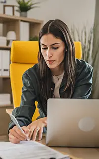 adult woman think and looking at credit report