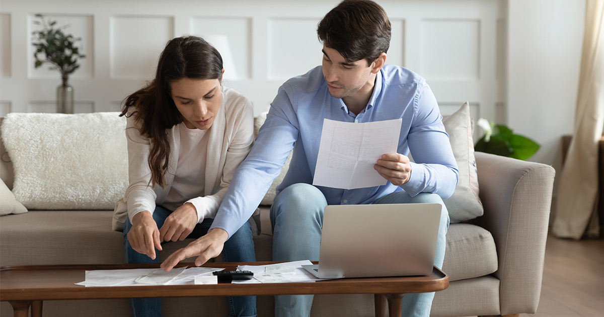 couple going over financial papers together
