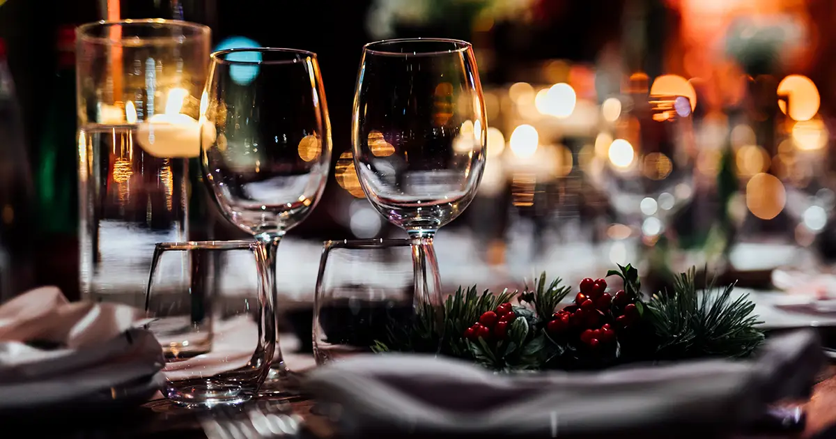 Table settings with glassware - Preparation for holiday wedding.