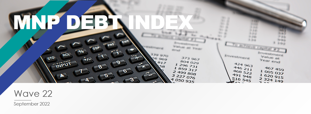 MNP Debt Index title with a calculator and spreadsheet photo in the background.