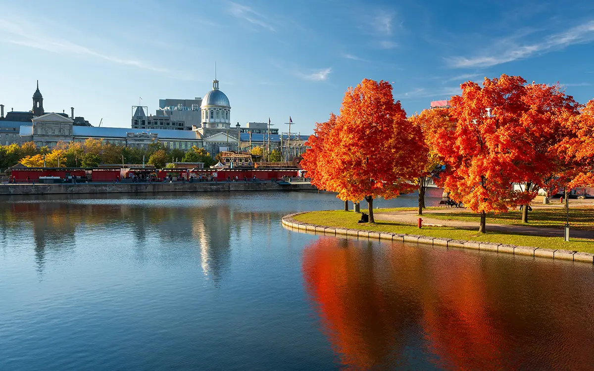 Image of building in Quebec with river in front of it