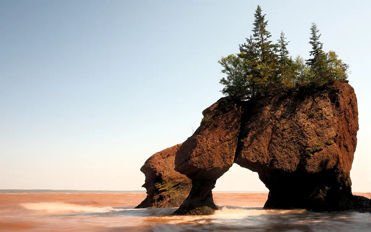 Scenic shot of Hopewell rocks at higher tide