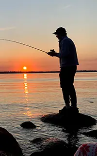 Fishing at sunset in Manitoba