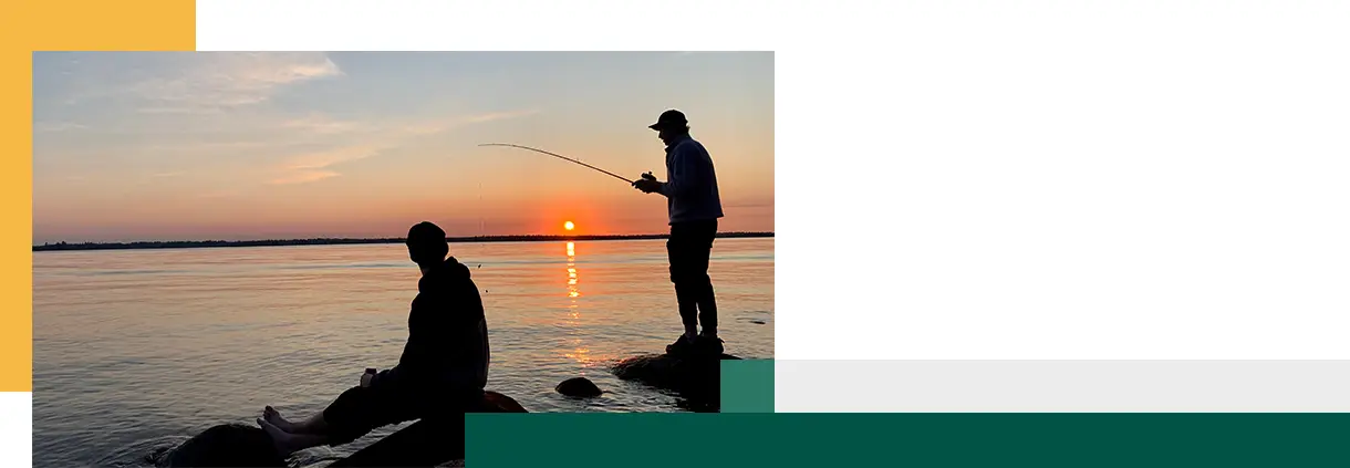 Fishing at sunset in Manitoba