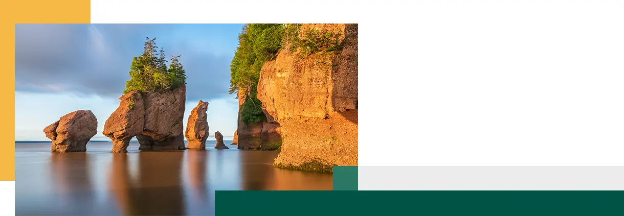 Hopewill Rock at sunrise during high tide, New Brunswick, Canada