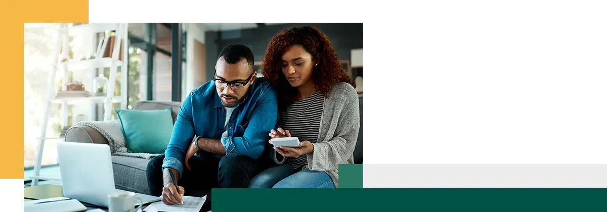 Young couple going over interest rates together