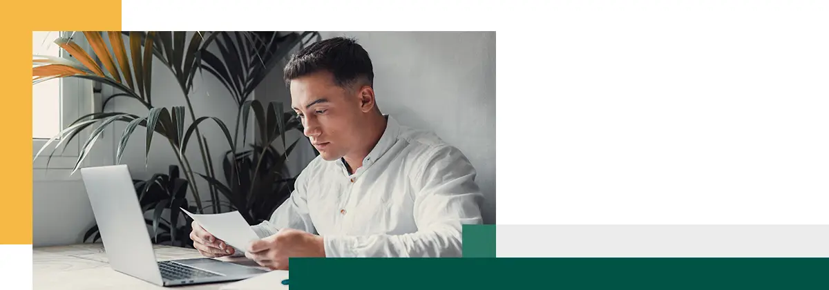 young man reading letter
