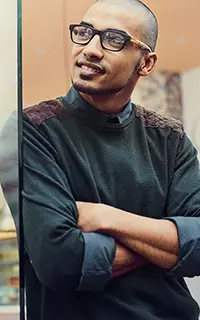 Arms crossed thinking and man at entrance of coffee shop for opening of small business startup