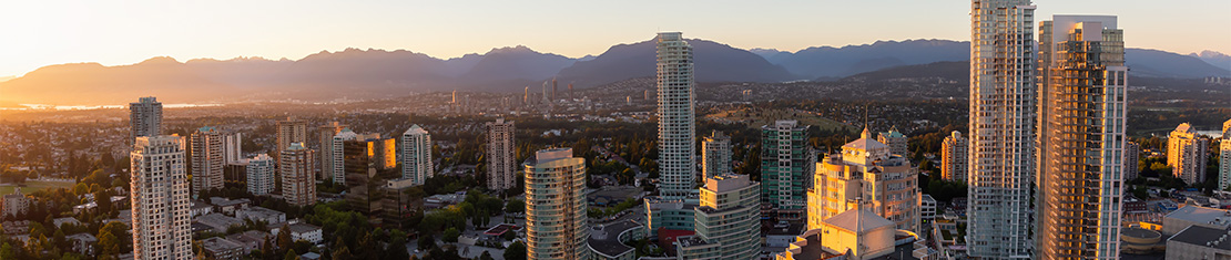 View of downtown Burnaby with the mountains in the background.
