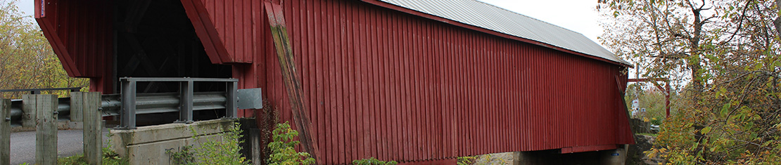 Old, covered, red bridge